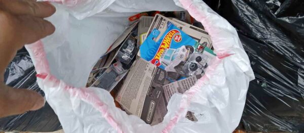 Trash Bags Full of Brand New Hot Wheels